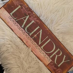 Metal laundry room sign